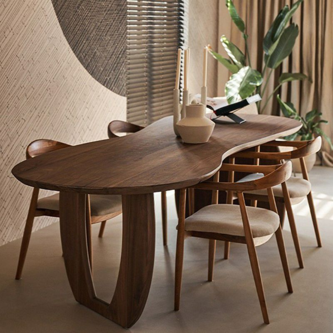 Abstract Round Walnut Dining Room Table Styled in a mid century dining room