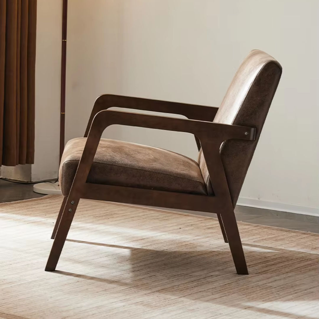 Accent chair in brown faux leather side view