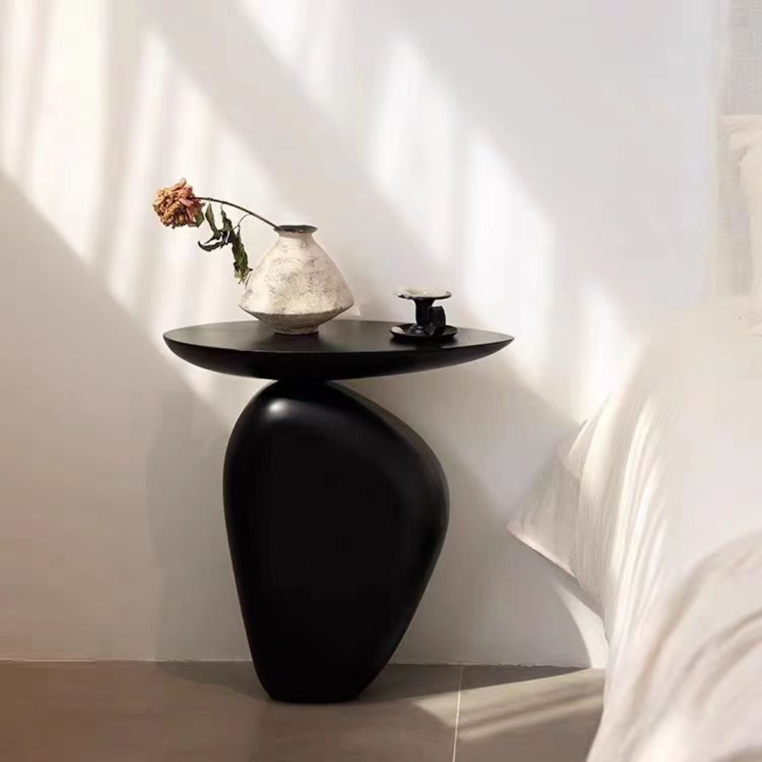 Black Stone Shape Living Room Side Table styled in a bedroom