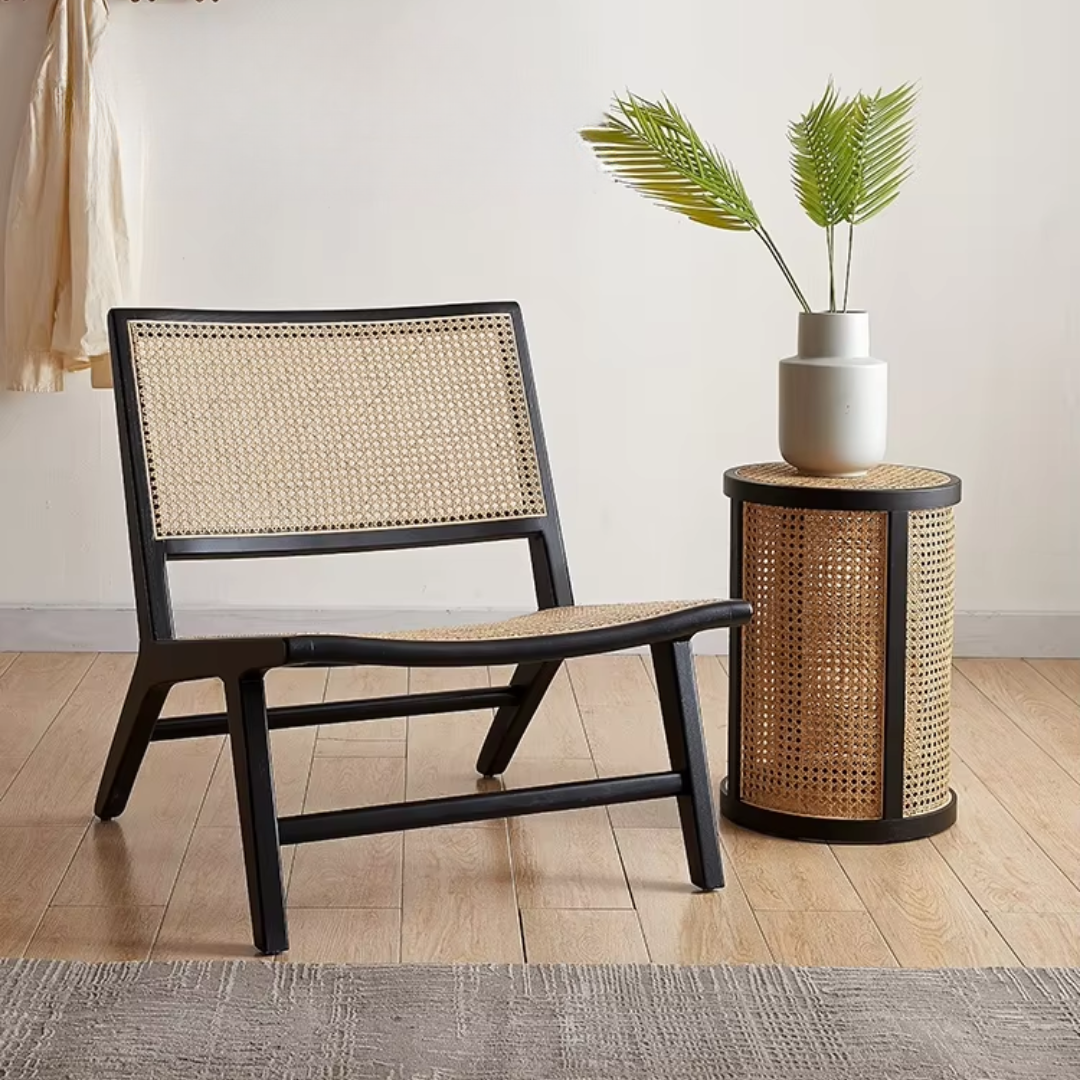 Black rattan coffee table styled in a living room