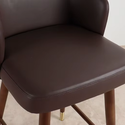 Brown Bar Stool With Back Leather close up pf the leather padded seat