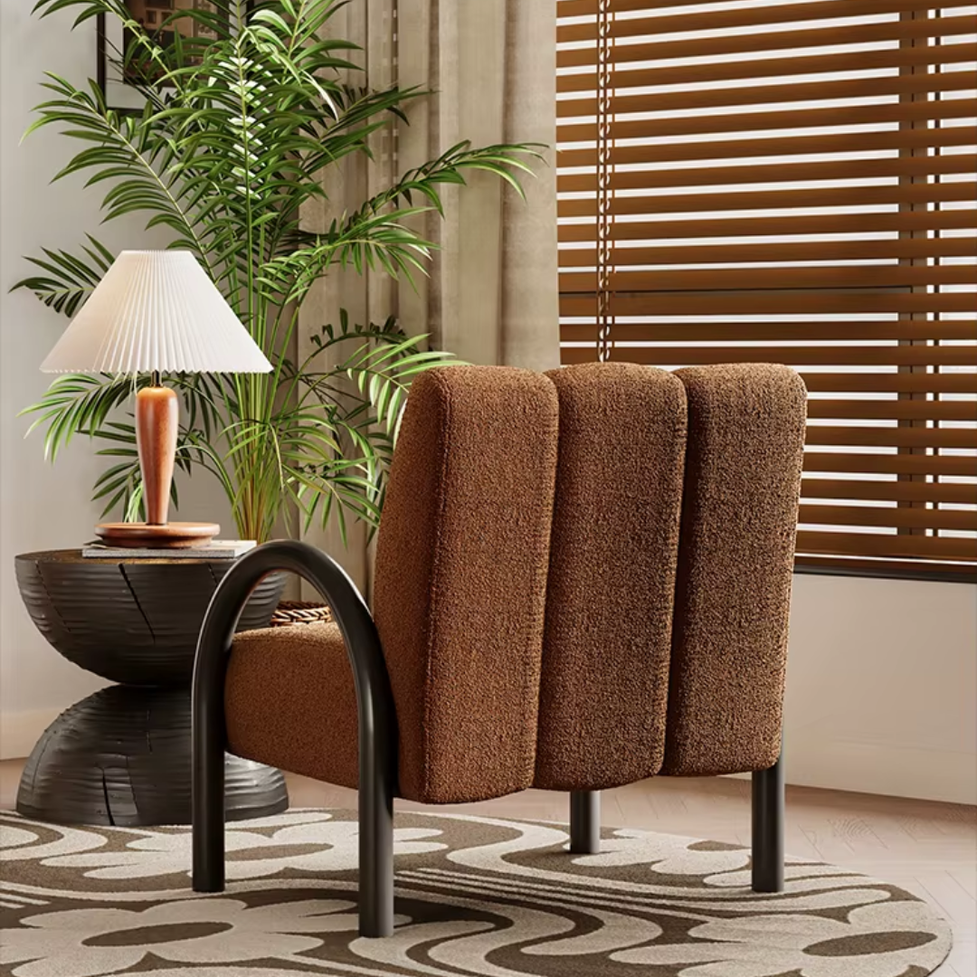 Back view of burnt orange accent armchair with wooden legs