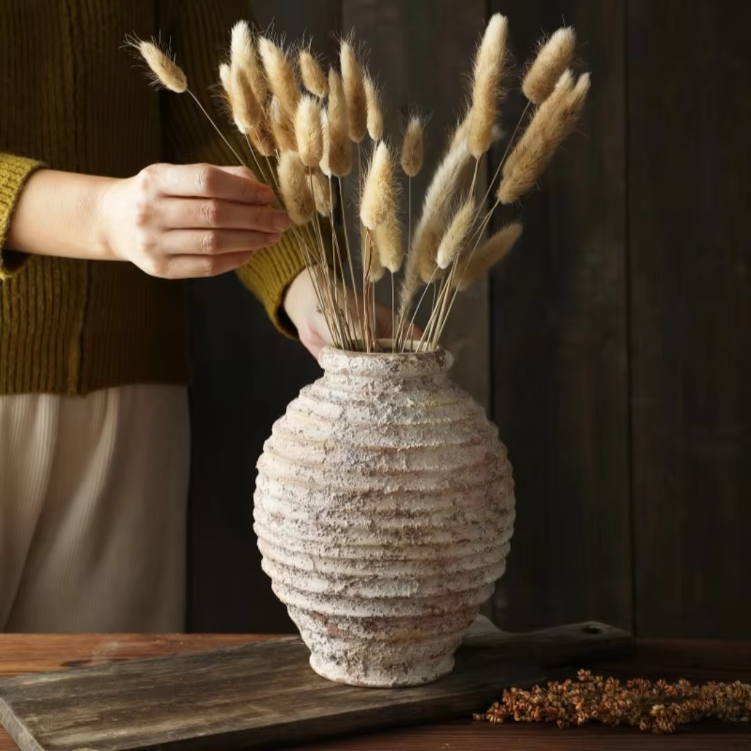 Concrete Beige Ceramic Vase positioned on a table with pampass grass