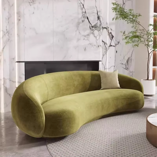 Front view of olive green velvet curved corner sofa