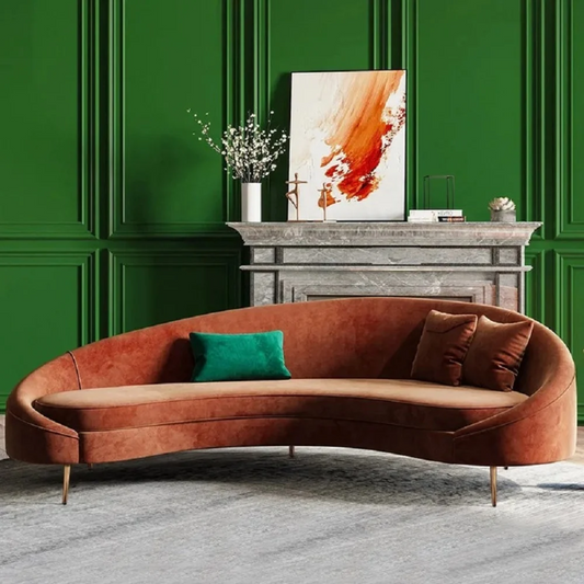 Front view of modern curved orange velvet sofa