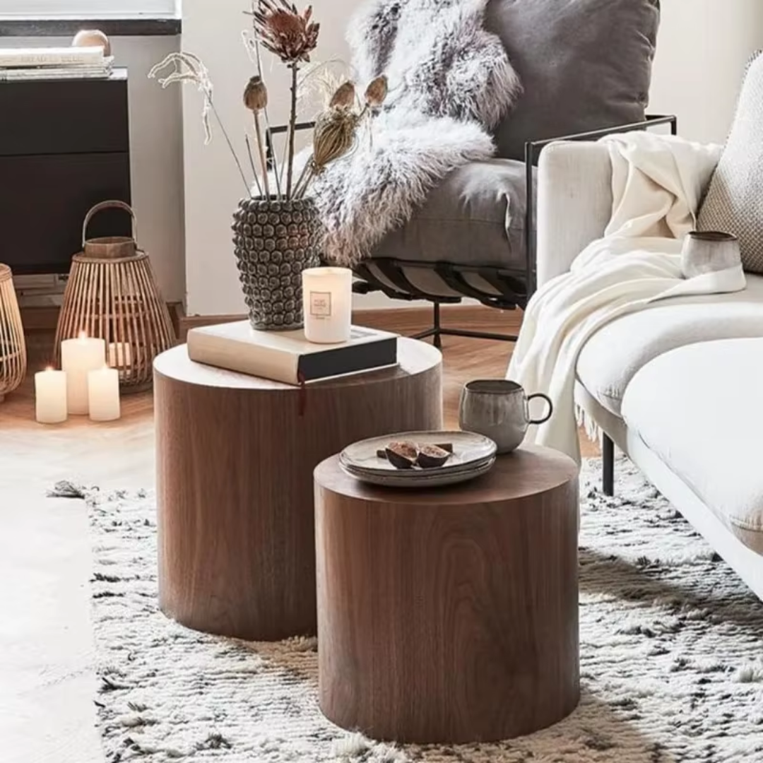 Round walnut coffee tables styled in a living room