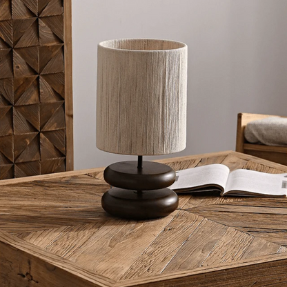 Solid Walnut Wood Creative Table Lamp positioned on a bedside table