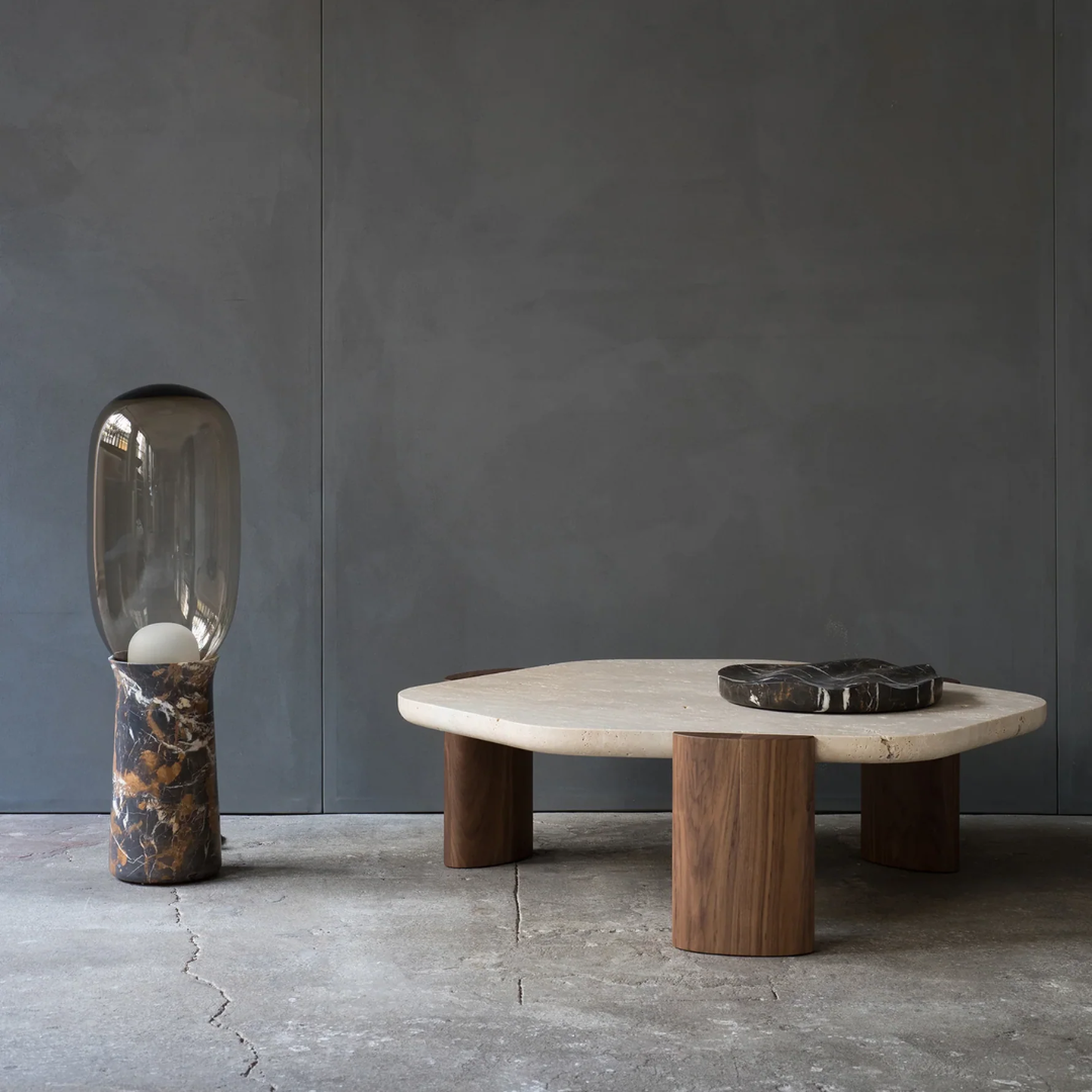 Side view of solid stone round coffee table