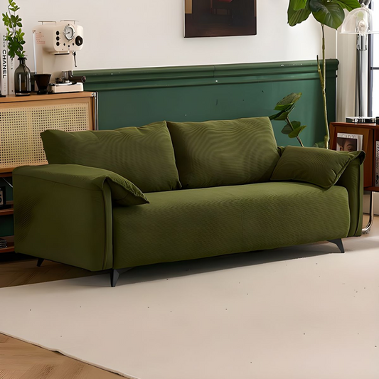 Side angle of green upholstered two-seater couch