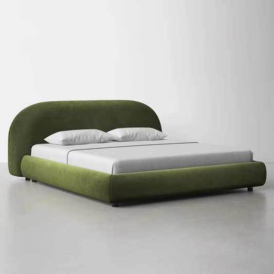 Upholstered Olive Green bed frame in a modern studio