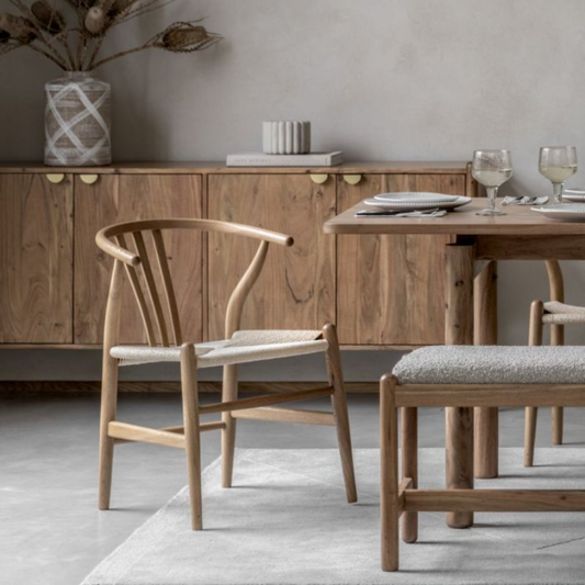 Weaved Rattan Dining Table Chair styled in a farmhouse dining room