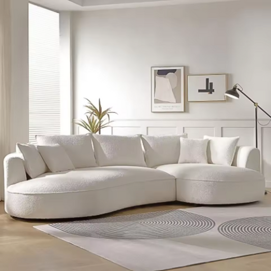 Front view of white boucle curved luxury sofa