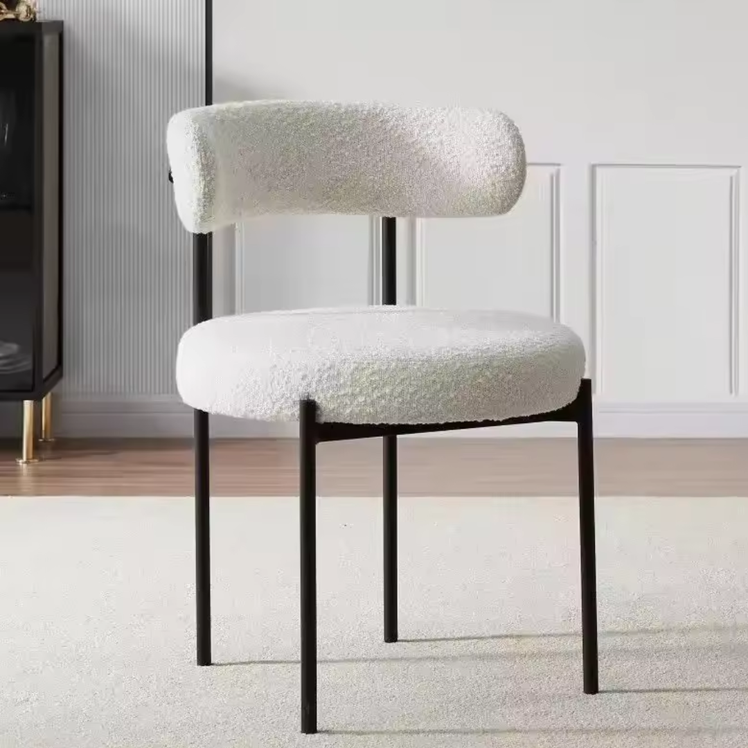 Front view of white boucle metal frame dining chair