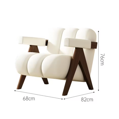 Detailed shot of wooden legs on white boucle lounge chair