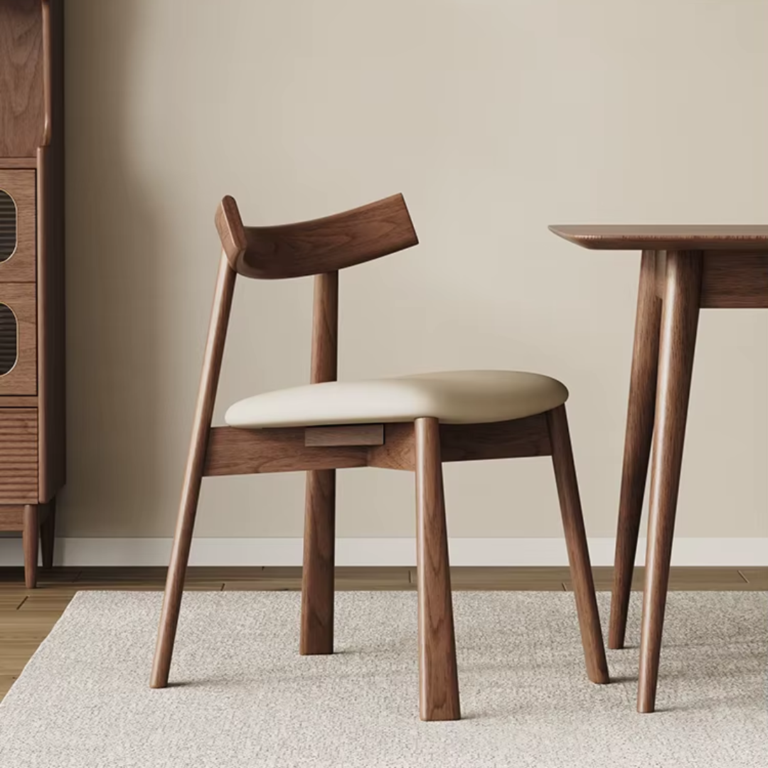 front/side view of a wood frame leather dining chair