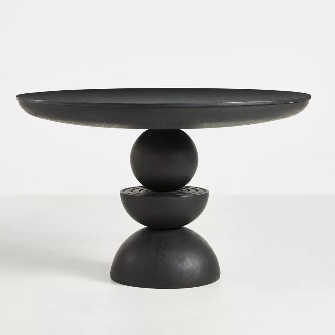 Round Black Pedestal Dining Table against a white background