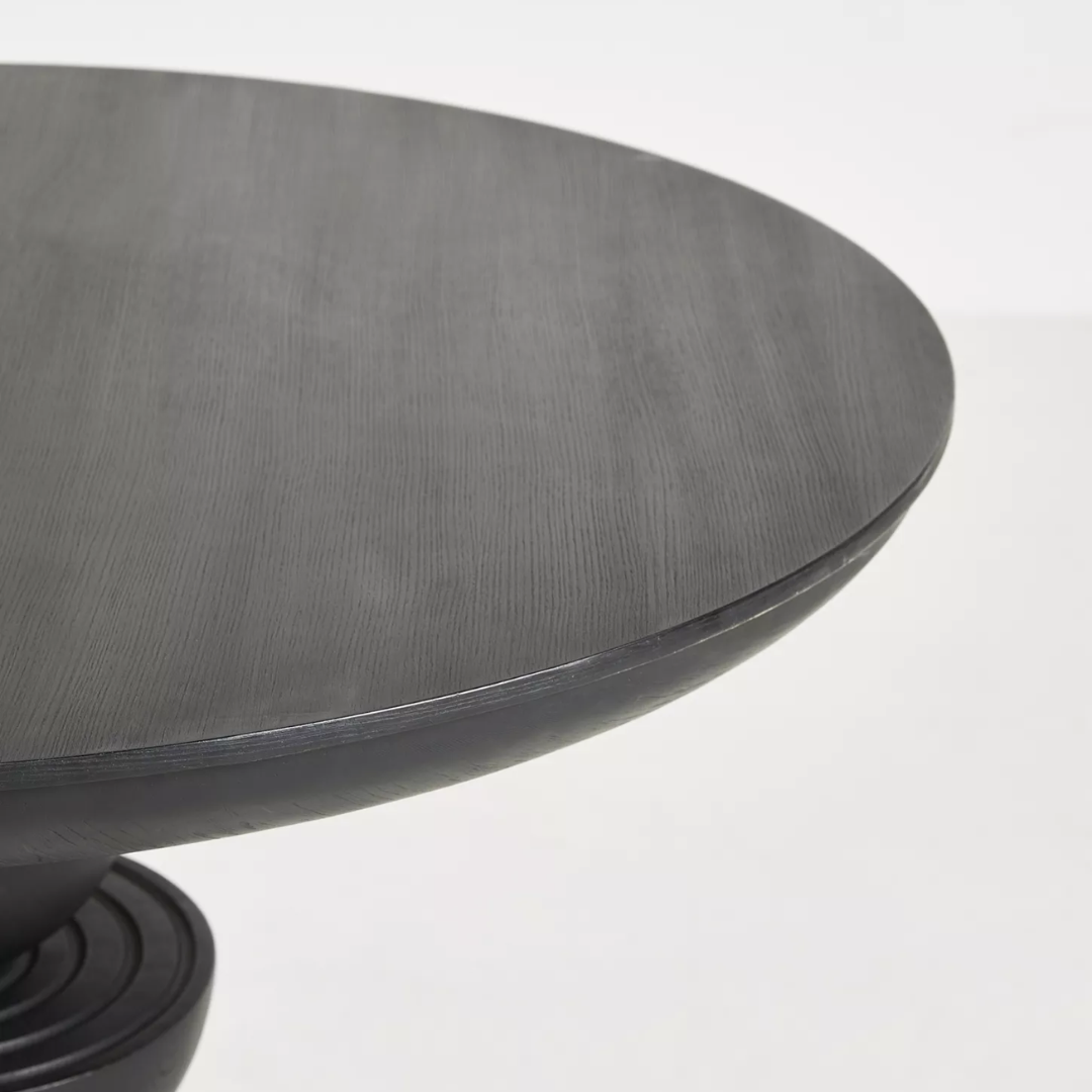 Round Black Pedestal Dining Table close up of the table top