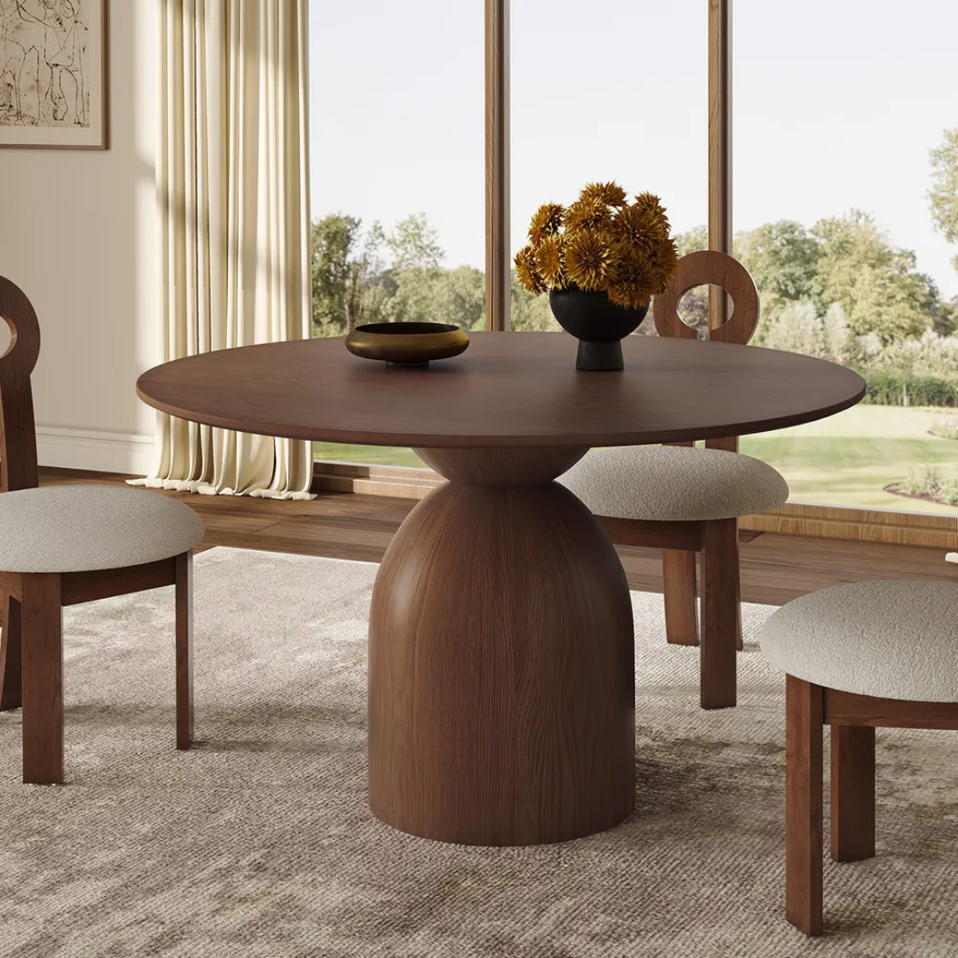 Round Dark Wood Dining Room Table styled with matching dining chairs 