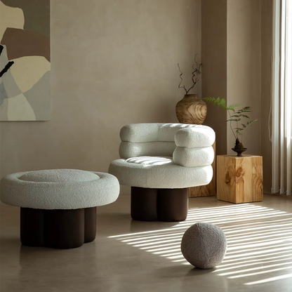 Minimalist setting with boucle fabric barrel chair